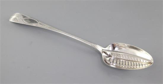 A large George IV Irish silver strainer spoon, by Samuel Neville, Length 324mm Weight 3.9oz/122grms